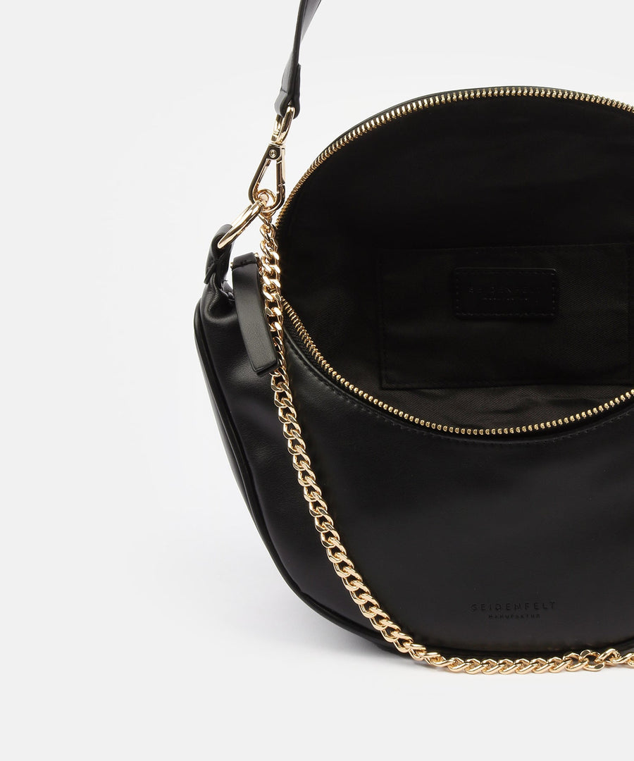 SET51H0FE - Q11Fair produzierter, sportlicher Crossbody Bag Skien von Seidenfelt - Wildflowersblack/gold